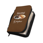 Durable brown PU leather Bible Cover with black handle, zipper, and stitching, fits most Bibles and features "Powered by Purpose" design.