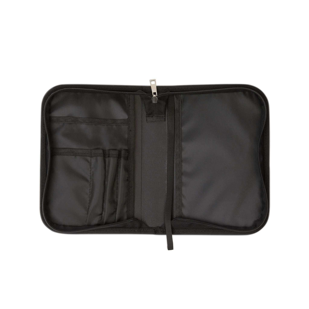 Bible cover with multiple interior pockets for notes and pens