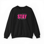 Black sweatshirt with pink and white "Stay Positive" motivational text design