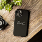 Black Winner Mindset phone case with "I am a WINNER" text, durable dual layer protection, matte finish, supports wireless charging