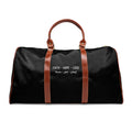 Black Faith Hope Love travel bag with brown PU leather handles and gold zipper