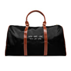 Black Faith Hope Love travel bag with brown PU leather handles and gold zipper