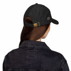 Black corduroy Never Give Up Cap with adjustable gold buckle