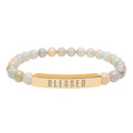 Close-up of a sleek, hypoallergenic 316L surgical grade stainless steel stretch bar bracelet symbolizing faith and positivity