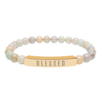Close-up of a sleek, hypoallergenic 316L surgical grade stainless steel stretch bar bracelet symbolizing faith and positivity
