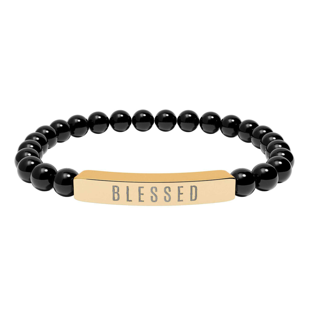 Close-up of a hypoallergenic 316L stainless steel stretch bar bracelet symbolizing faith and positivity