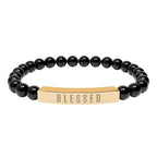 Close-up of a hypoallergenic 316L stainless steel stretch bar bracelet symbolizing faith and positivity