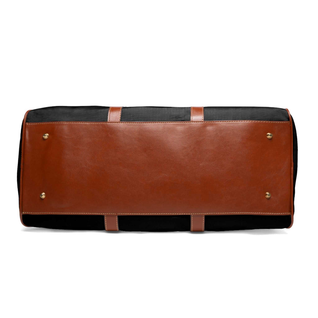 Bottom view of Faith Hope Love travel bag with brown PU leather base and gold-colored metal feet