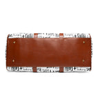 Bottom view of Faith Travel Bag showing brown PU leather base