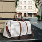 White Christian Cross travel bag with brown PU leather handles and adjustable shoulder strap, gold zipper, and patterned cross design