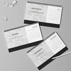 Grace Daily Calendar 2026 with black spiral binding showing monthly grid on matte finish paper