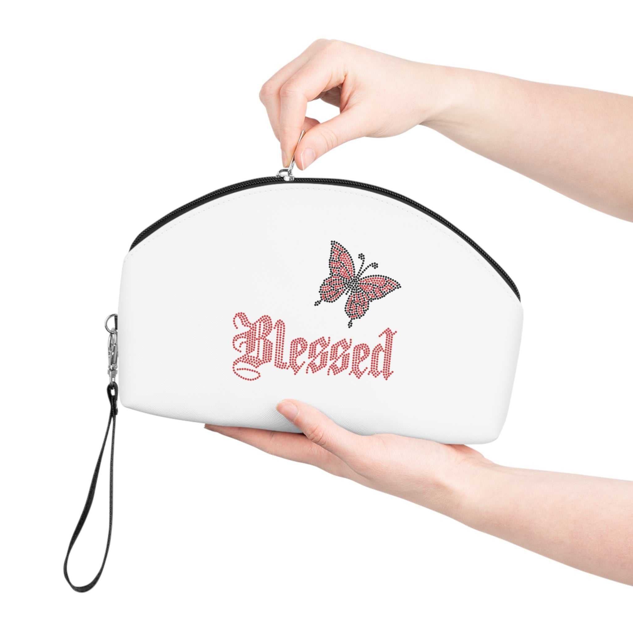 Stylish Blessed Makeup Bag in faux leather with detachable strap and curved shape for organizing cosmetics