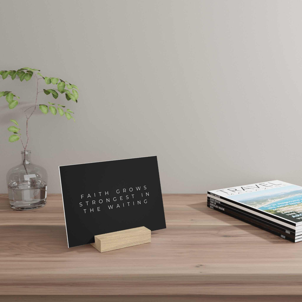 Faith Grows Gallery Board with hand-crafted oak stand on wooden desk