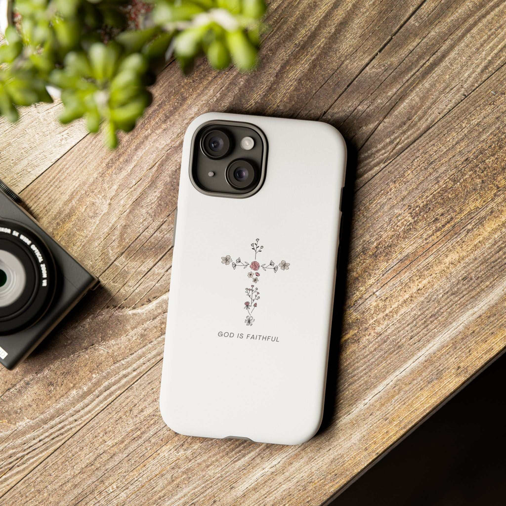 Faithful God phone case with floral cross design and "God is Faithful" text on white background