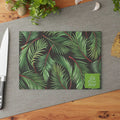 Glass cutting board with green palm leaf design and "Life is Good" label