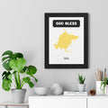 God Bless Asia poster with yellow Asian map and spiritual design in black frame on wall above decorated white shelf