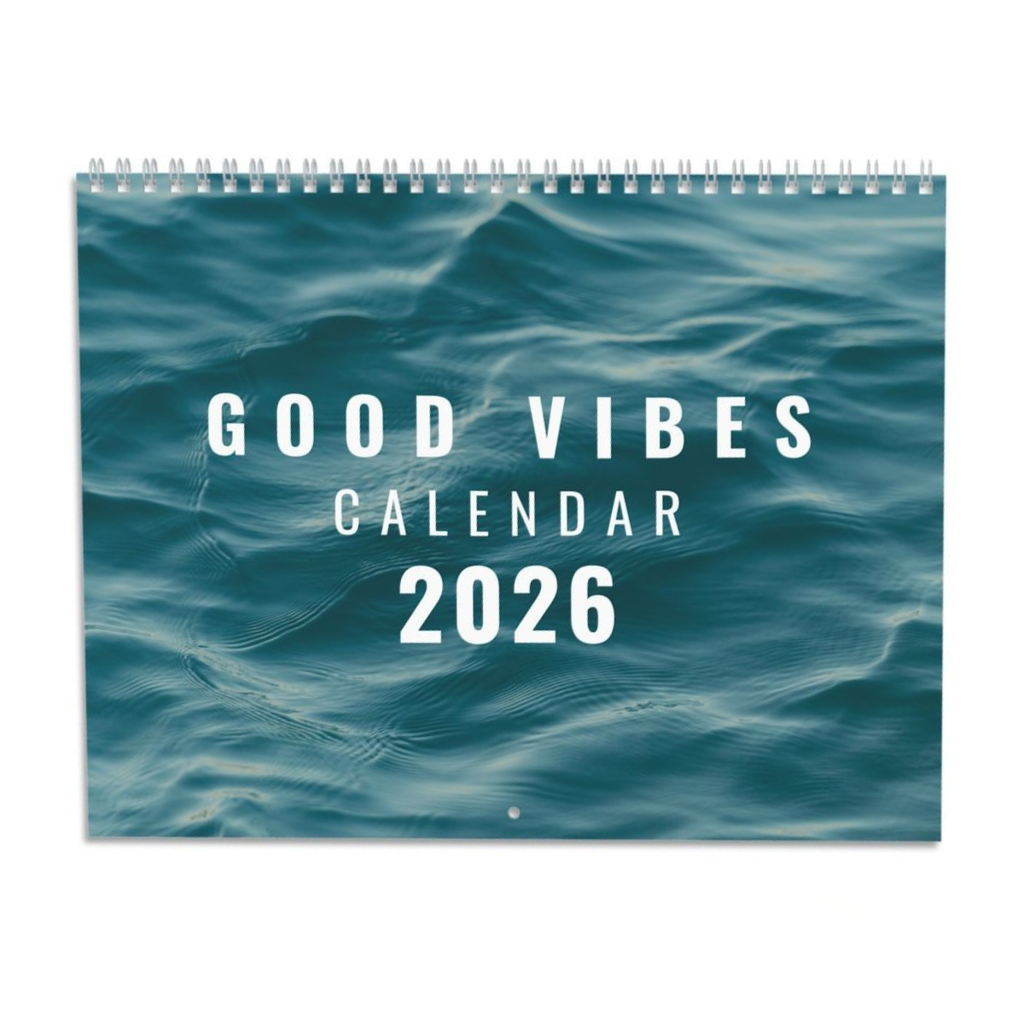 2026 Good Vibes Calendar with colorful motivational quotes and silver wire binding