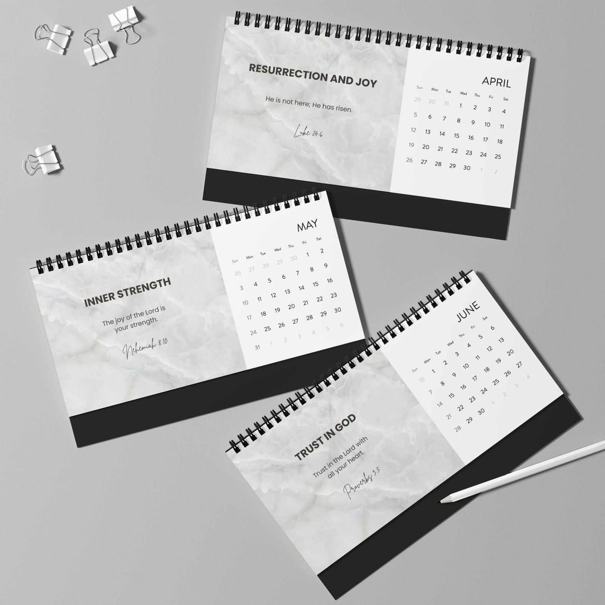 Grace Daily Calendar 2026 with black spiral binding and monthly grid on matte paper