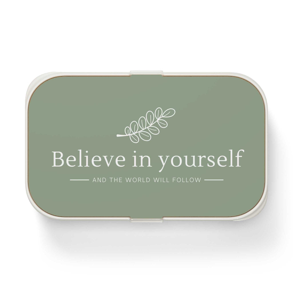 Green bento lunch box with "Believe in yourself" text