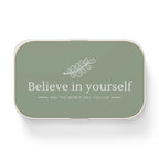 Green bento lunch box with "Believe in yourself" text