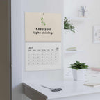 Inspirational Calendar 2026 hanging on wall with motivational quote
