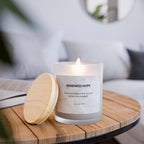 Natural off-white Renewed Hope Candle with wooden wick in frosted glass vessel and raw maple lid