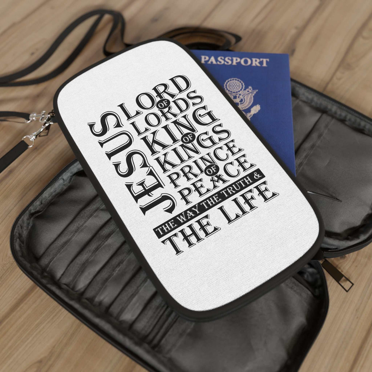 Jesus Reigns Passport Wallet with black and white scripture design