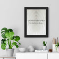 Framed Light Wins Always poster with inspirational message on wall above white shelf with plants and decor