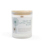 Frosted glass candle with coconut soy wax and wooden wick topped with a raw maple lid, 50-hour burn time.