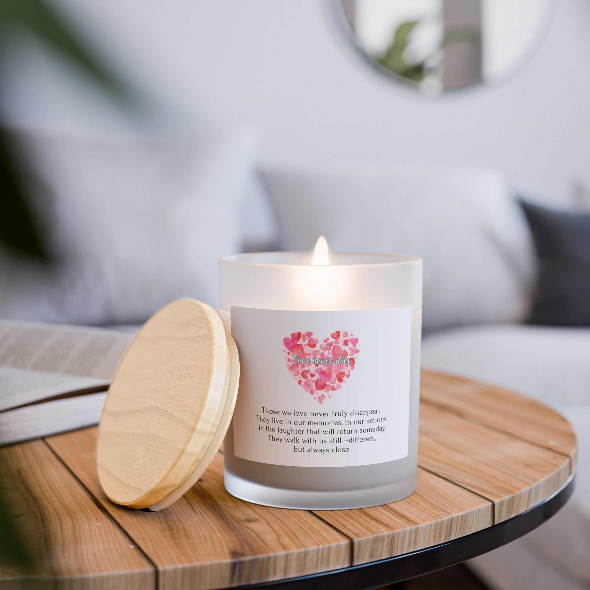 Love Lives On Candle glowing with wooden wick in frosted glass