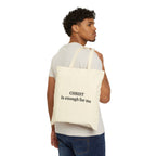 Man carrying Tote Bag with "CHRIST is enough for me" text