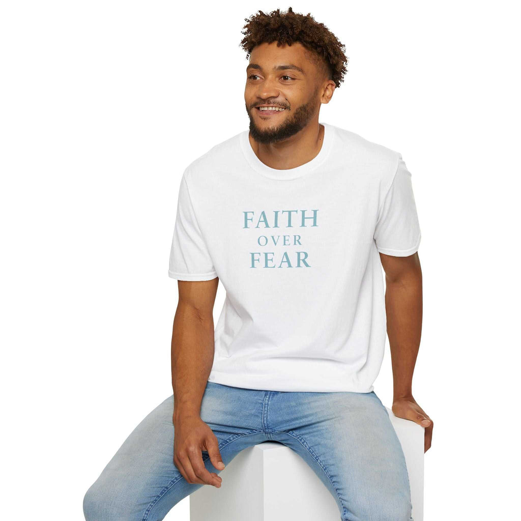 Man wearing white T-shirt with "Faith Over Fear" text, classic fit, made of 100% ring-spun cotton