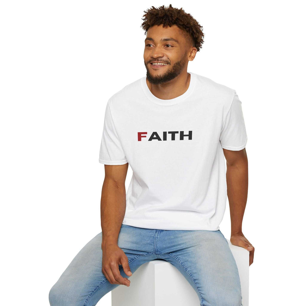Man wearing white Faith T-shirt with classic fit and ring-spun cotton material sitting on white block