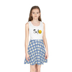 Girl wearing a mid-length sleeveless sundress with a white top featuring "Smile" and a smiley face, and a blue A-line skirt with white daisies.