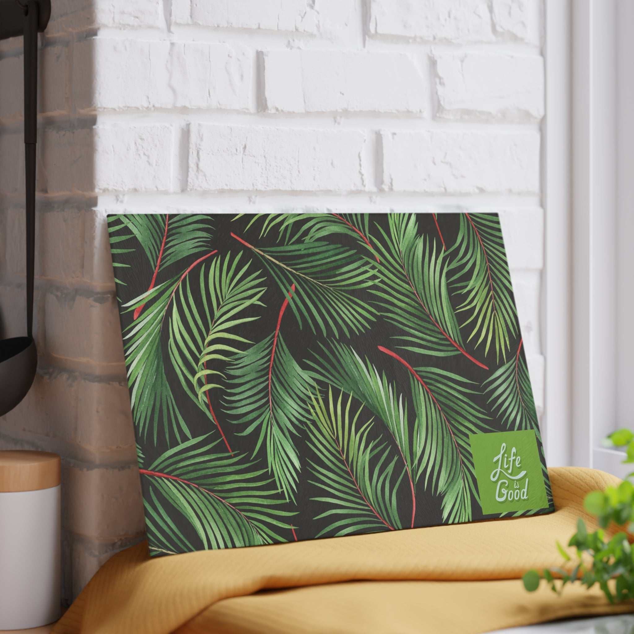 Tempered glass cutting board with green palm leaf design