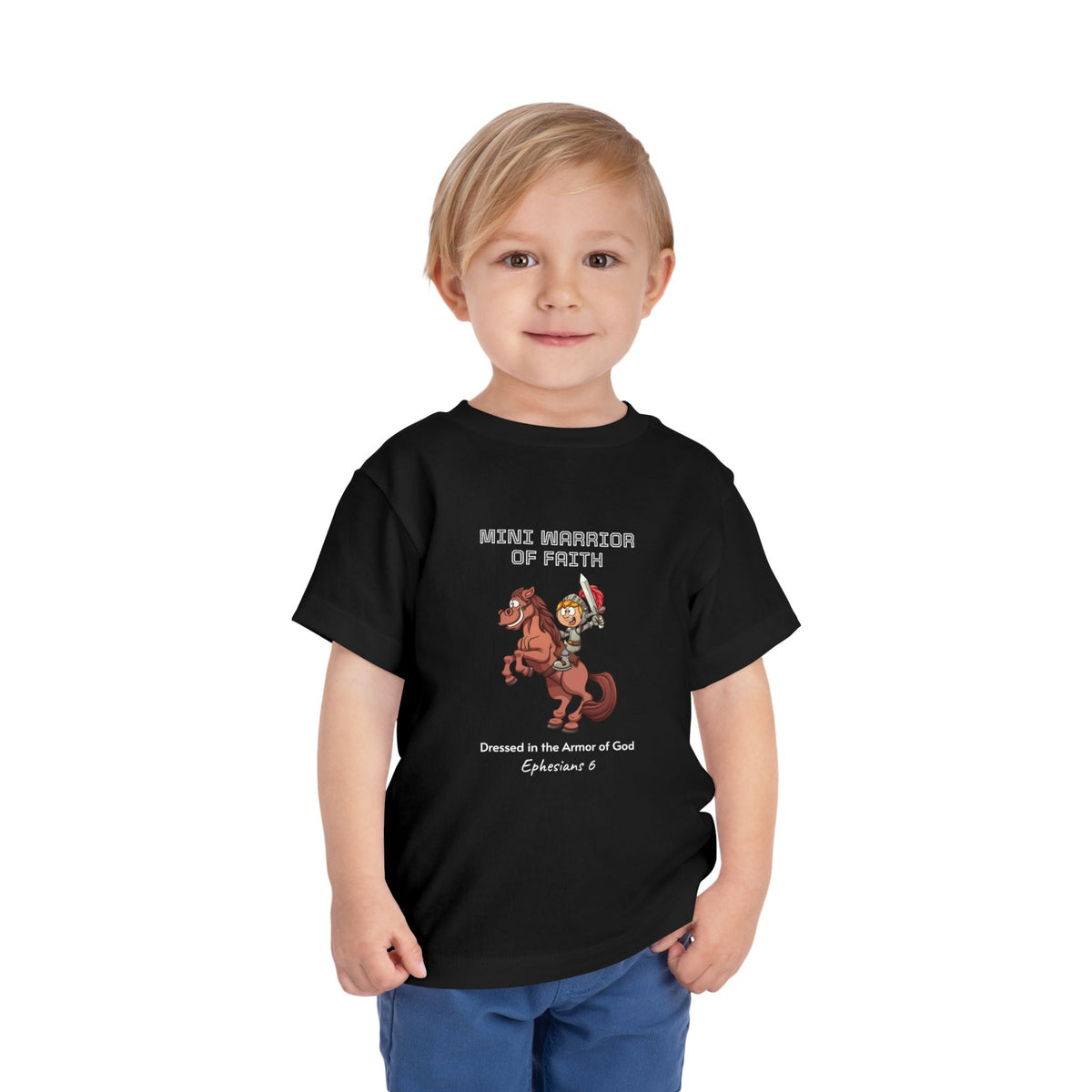 child wearing black Warrior of Faith T-Shirt with horse and armor graphic and faith message