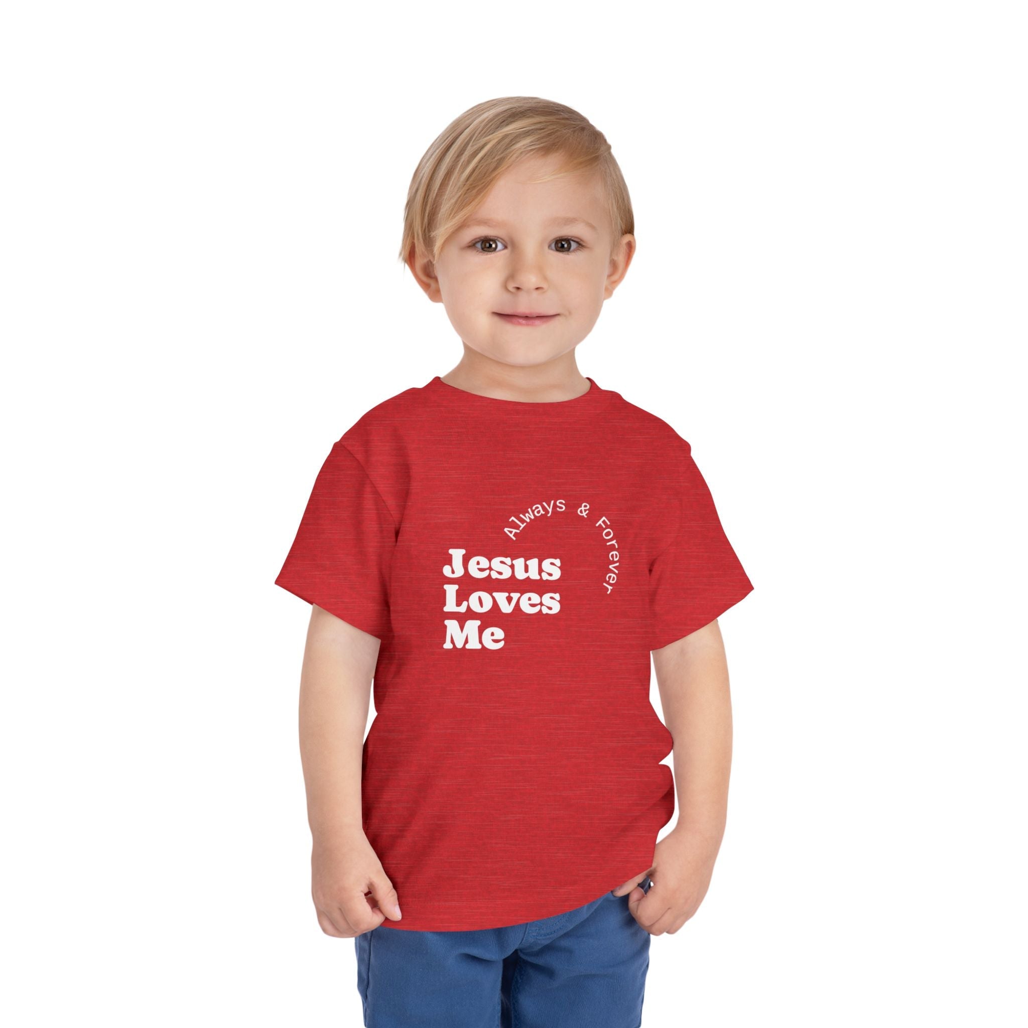 child wearing red Jesus Loves Me T-Shirt with white text and blue shorts