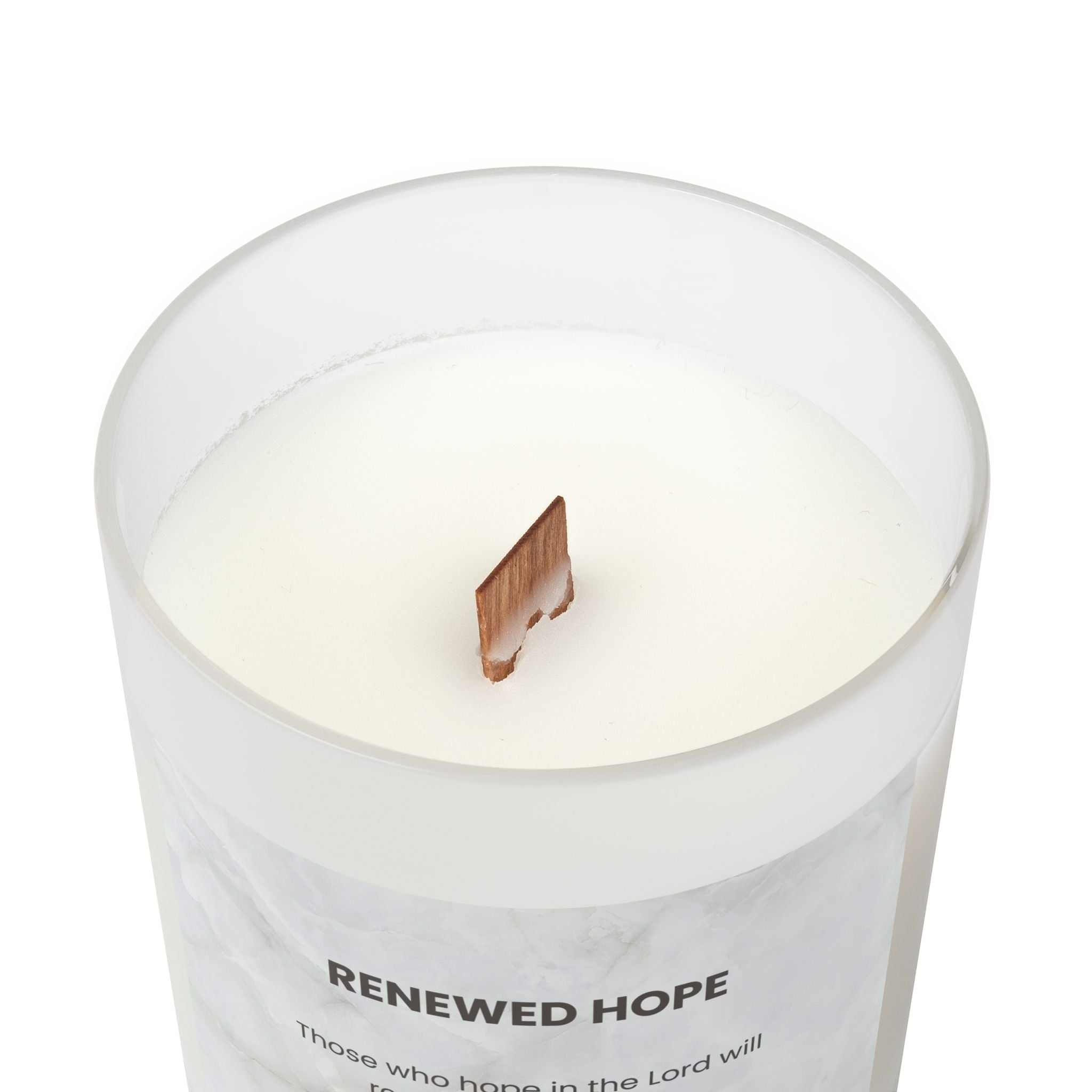 Natural off-white Renewed Hope Candle with wooden wick in frosted glass vessel and raw maple lid