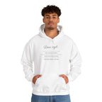White Dieu En Action hoodie with faith-inspired text, classic fit, cotton-polyester blend, worn by male model