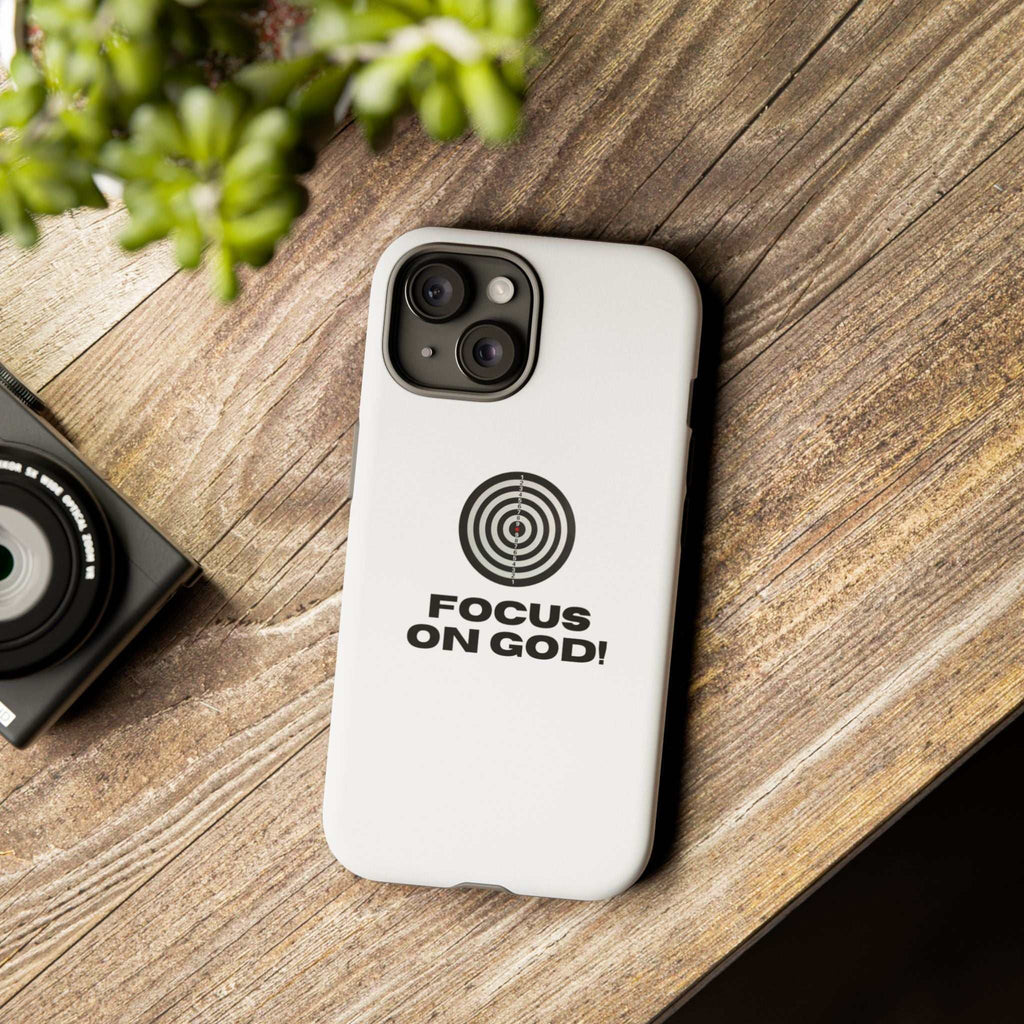 Durable Faith Focus phone case with "FOCUS ON GOD!" text and target design, dual layer protection, matte finish, compatible with wireless charging