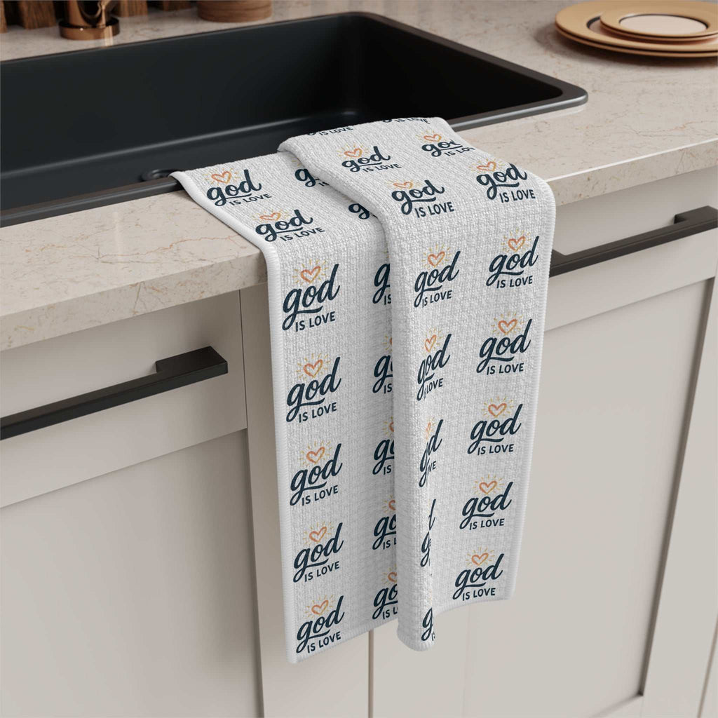 White microfiber tea towel with "God is Love" text pattern
