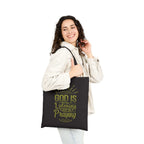Woman carrying black 100% cotton God Listens Tote Bag
