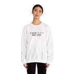 Woman wearing white Faith Fuels Dreams sweatshirt with classic fit and inspirational text