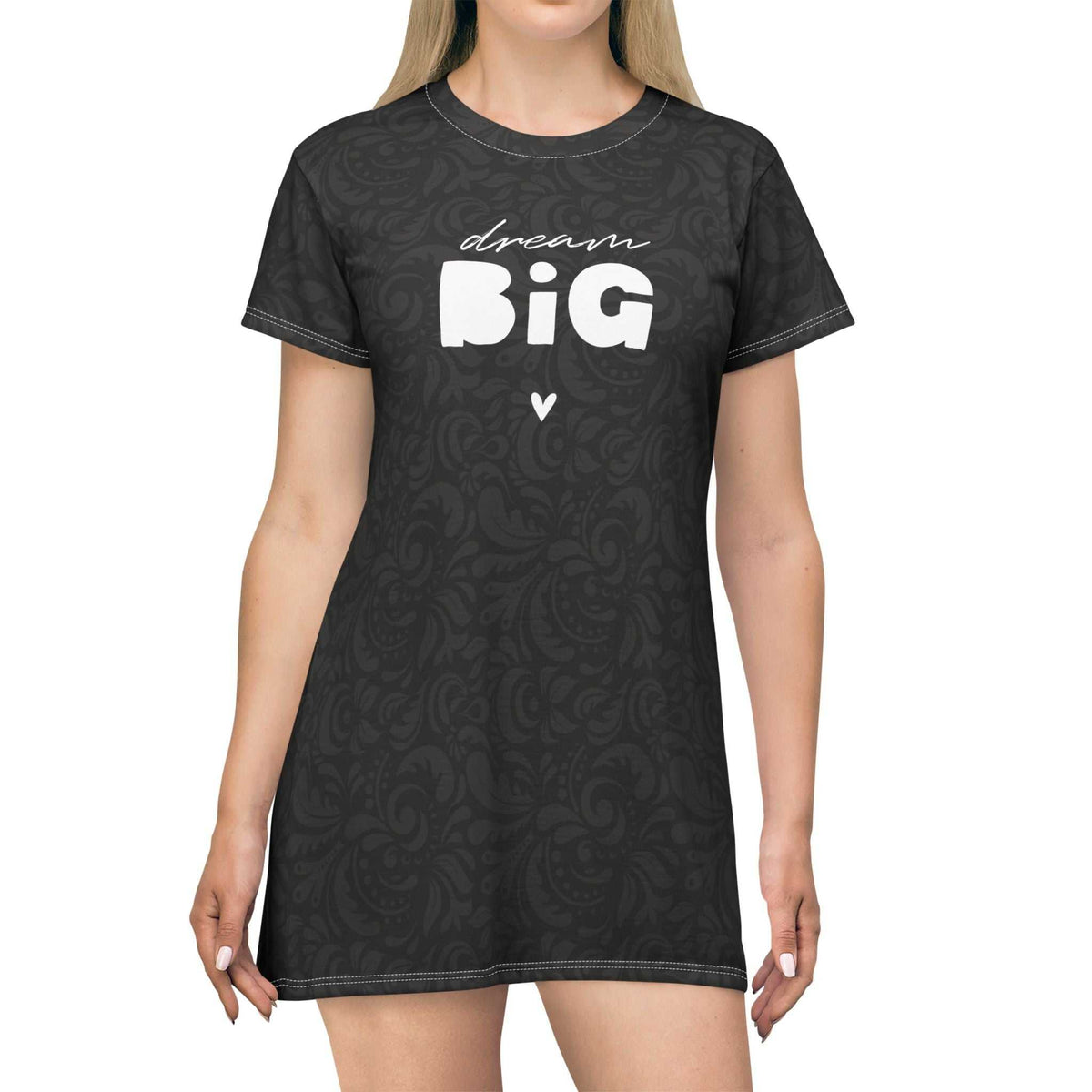 Woman wearing black Dream Big T-Shirt Dress with white text