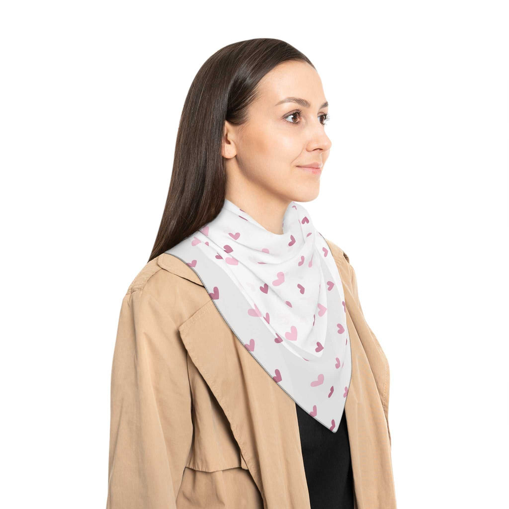 Woman wearing sheer pink hearts poly scarf with black stitching