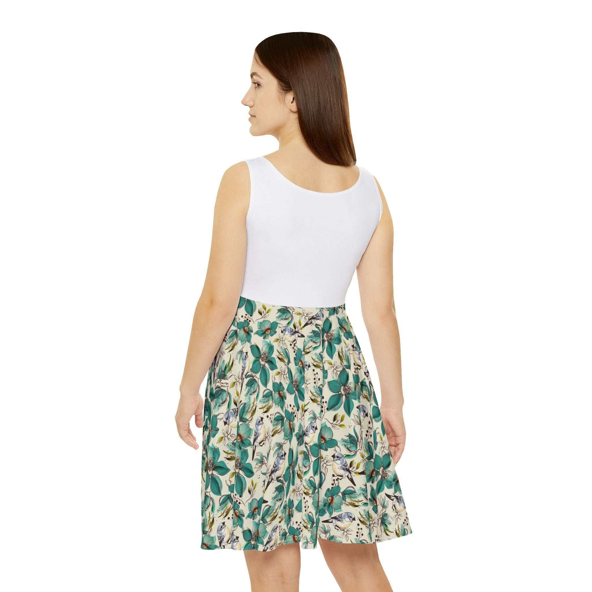 Woman wearing sleeveless Never Stop Dreaming Dress with white top